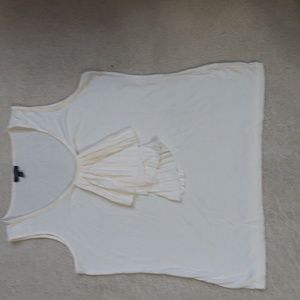Cute sleeveless summer top with ruffle bib